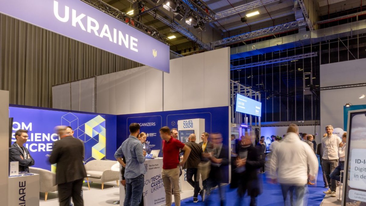 Ukraine's booth at the Smart Country Convention 2023, participants in the foreground